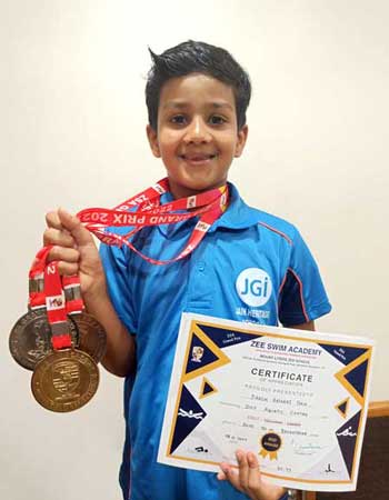 Daksh Nataraj Naik of Grade 2 has won medals in Swimming competition