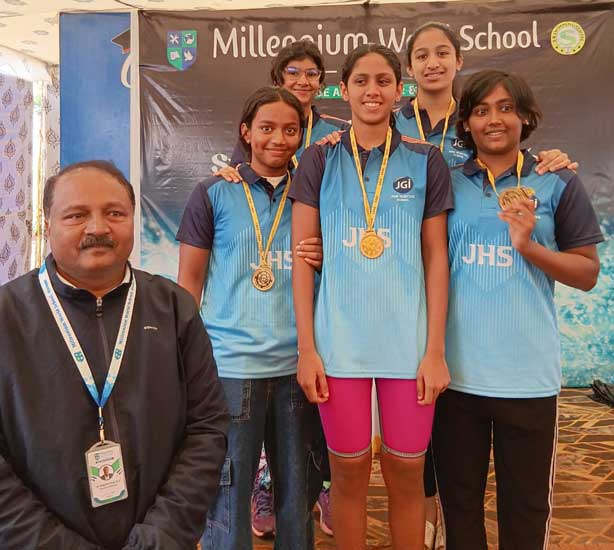 jhs swimming team wins at Hassan 2025